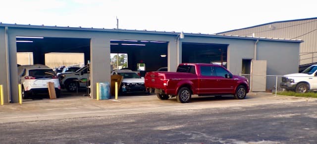 Repair Options — Lease/Resale Protection & Value-Smart Plans — Speedeezz Auto Finish collision repair service bays in Fort Myers, FL