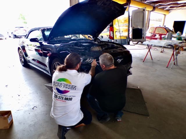 Speedeezz Auto Finish technicians repairing a Mustang in Fort Myers