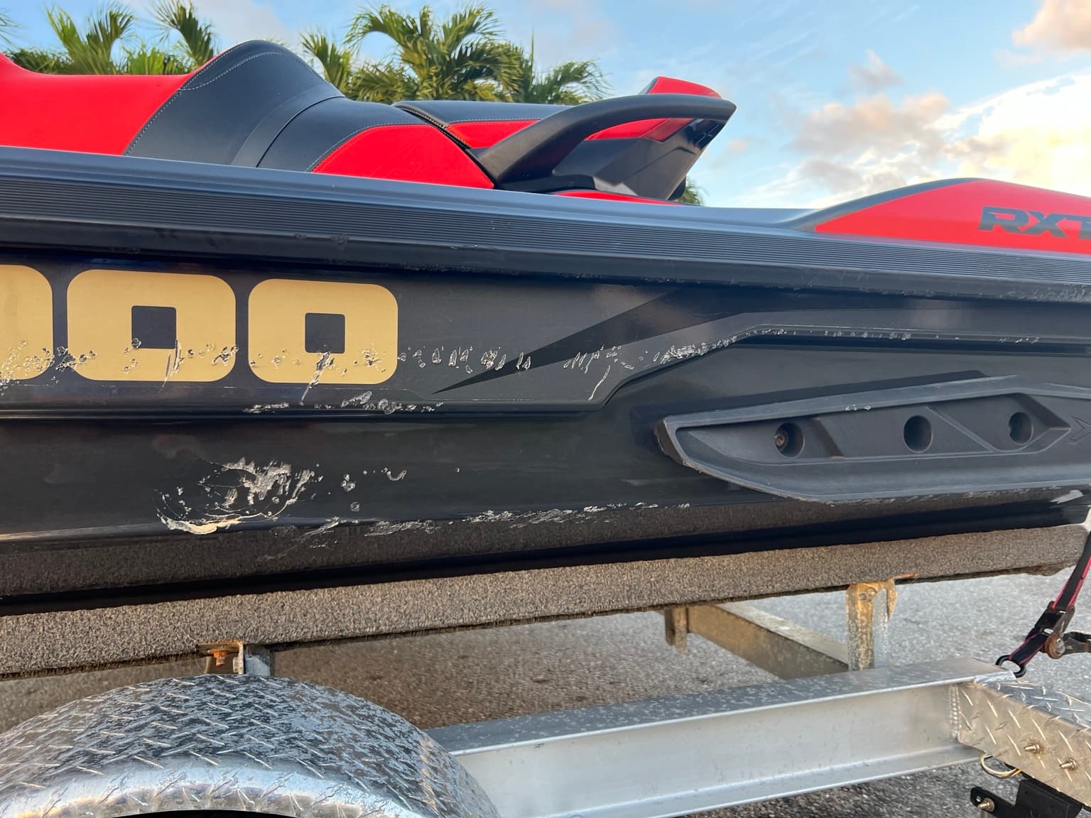 Scratches and gouges on the exterior of a personal watercraft